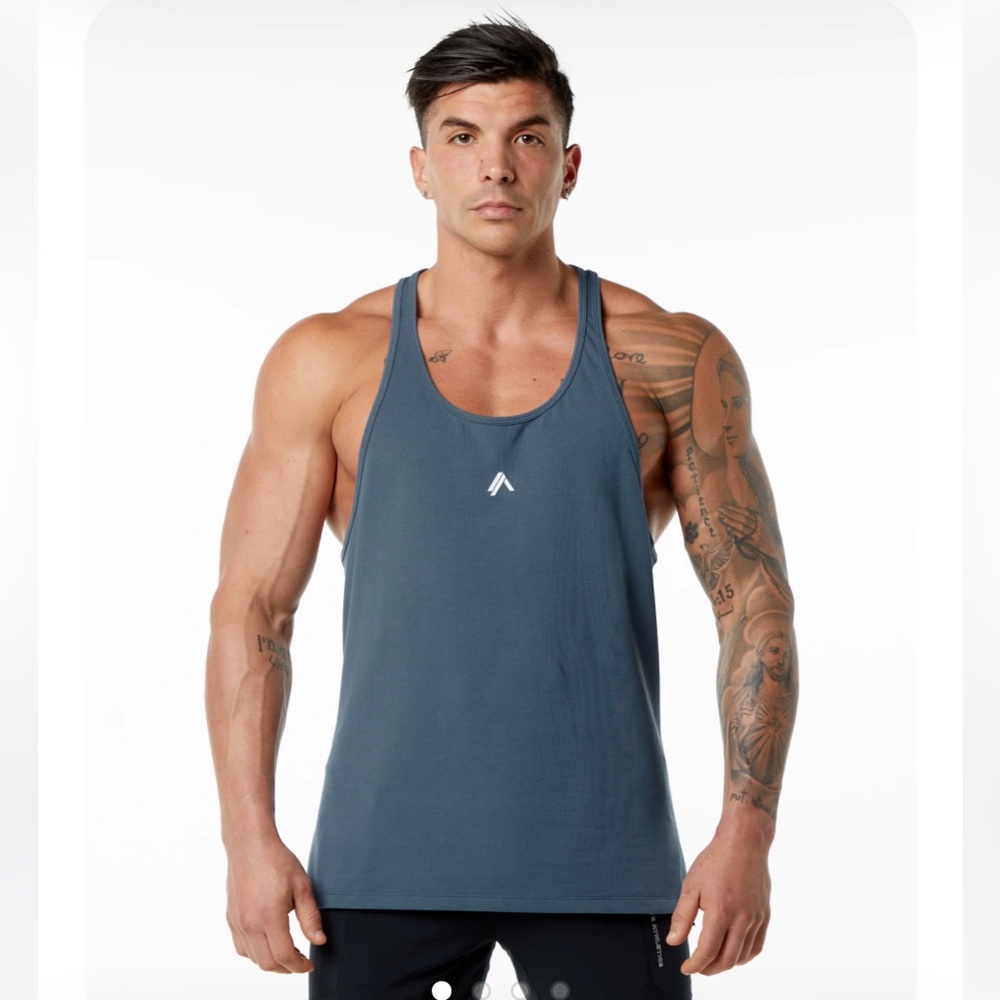 Four Brand New Alphalete emblem tanks still in package